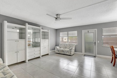 Charming 2-Bedroom, 2-Bathroom Condo in sought after Berkshire D on Hillsboro Pines Golf in Florida - for sale on GolfHomes.com, golf home, golf lot