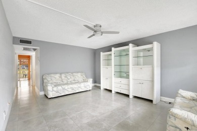 Charming 2-Bedroom, 2-Bathroom Condo in sought after Berkshire D on Hillsboro Pines Golf in Florida - for sale on GolfHomes.com, golf home, golf lot