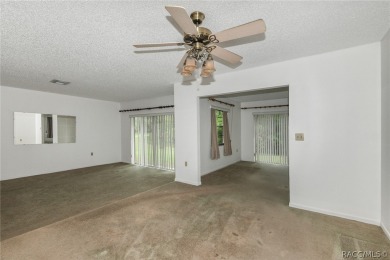 Spacious 4 BEDROOM home with 2 car garage on an OVERSIZED on Citrus Springs Country Club in Florida - for sale on GolfHomes.com, golf home, golf lot