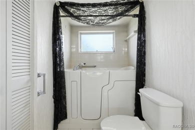 Welcome to this charming and spacious 3-bedroom, 3-bathroom home on Plantation Inn and Golf Resort  in Florida - for sale on GolfHomes.com, golf home, golf lot