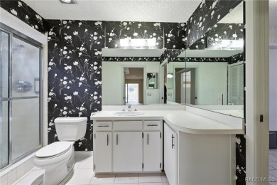 Welcome to this charming and spacious 3-bedroom, 3-bathroom home on Plantation Inn and Golf Resort  in Florida - for sale on GolfHomes.com, golf home, golf lot