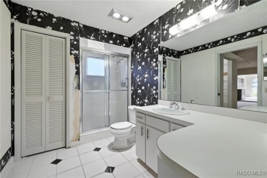 Welcome to this charming and spacious 3-bedroom, 3-bathroom home on Plantation Inn and Golf Resort  in Florida - for sale on GolfHomes.com, golf home, golf lot