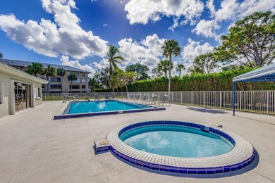 This well maintained and spacious condo comes with real bamboo on The Country Club At Boca Raton in Florida - for sale on GolfHomes.com, golf home, golf lot