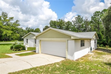 Spacious 4 BEDROOM home with 2 car garage on an OVERSIZED on Citrus Springs Country Club in Florida - for sale on GolfHomes.com, golf home, golf lot