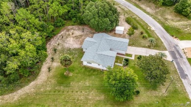 Spacious 4 BEDROOM home with 2 car garage on an OVERSIZED on Citrus Springs Country Club in Florida - for sale on GolfHomes.com, golf home, golf lot