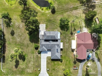 Welcome to this charming and spacious 3-bedroom, 3-bathroom home on Plantation Inn and Golf Resort  in Florida - for sale on GolfHomes.com, golf home, golf lot
