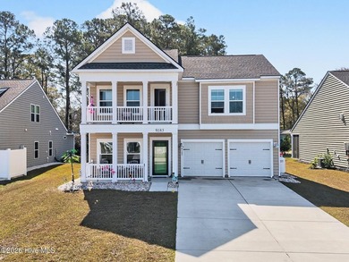 Located in the highly desirable Beach Walk community and just a on Oyster Bay Golf Links in North Carolina - for sale on GolfHomes.com, golf home, golf lot