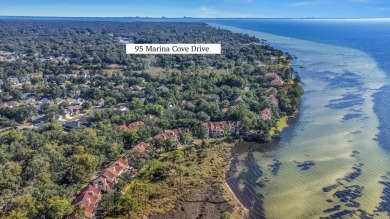 I loved living in Marina Cove Village, and I'm sure you will on Bluewater Bay Resort in Florida - for sale on GolfHomes.com, golf home, golf lot