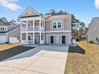 Located in the highly desirable Beach Walk community and just a on Oyster Bay Golf Links in North Carolina - for sale on GolfHomes.com, golf home, golf lot
