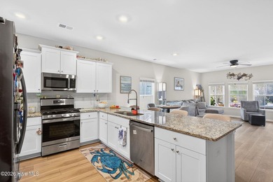 Located in the highly desirable Beach Walk community and just a on Oyster Bay Golf Links in North Carolina - for sale on GolfHomes.com, golf home, golf lot