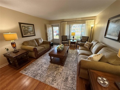 EXQUISITE, MOVE-IN FREADY and TASTEFULLY FURNISHED GROUND-FLOOR on On Top Of The World Golf Course in Florida - for sale on GolfHomes.com, golf home, golf lot