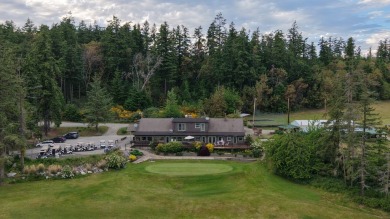 Nestled along the scenic shores of Discovery Bay and the on Discovery Bay Golf Club in Washington - for sale on GolfHomes.com, golf home, golf lot