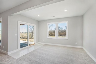 Fantastic open floor plan, large kitchen w/ 9ft island, built-in on Staley Farms Golf Club in Missouri - for sale on GolfHomes.com, golf home, golf lot