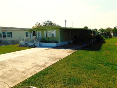 As you step into this well-maintained home, you're immediately on Betmar Acres Golf Club in Florida - for sale on GolfHomes.com, golf home, golf lot