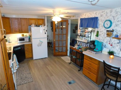 As you step into this well-maintained home, you're immediately on Betmar Acres Golf Club in Florida - for sale on GolfHomes.com, golf home, golf lot