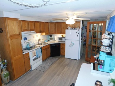 As you step into this well-maintained home, you're immediately on Betmar Acres Golf Club in Florida - for sale on GolfHomes.com, golf home, golf lot