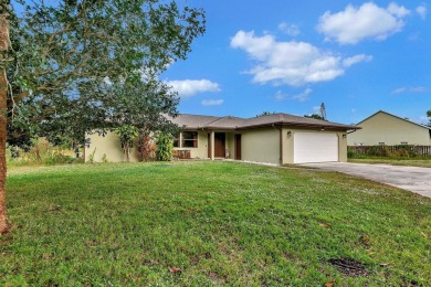Charming pool home in Papaya Village on a rare 3/4 acre homesite on Eagle Wood Golf Course in Florida - for sale on GolfHomes.com, golf home, golf lot