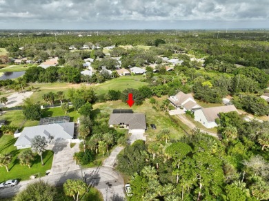 Charming pool home in Papaya Village on a rare 3/4 acre homesite on Eagle Wood Golf Course in Florida - for sale on GolfHomes.com, golf home, golf lot