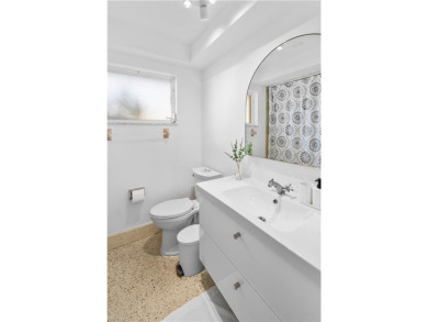 Renovated Mid-Century Modern Pool Home in the Heart of South on Whiskey Creek Country Club in Florida - for sale on GolfHomes.com, golf home, golf lot