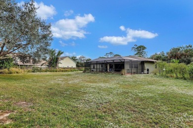 Charming pool home in Papaya Village on a rare 3/4 acre homesite on Eagle Wood Golf Course in Florida - for sale on GolfHomes.com, golf home, golf lot
