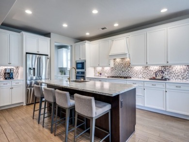 Experience the pinnacle of luxury in this beautiful on Wildhorse Golf Club of Robson Ranch in Texas - for sale on GolfHomes.com, golf home, golf lot