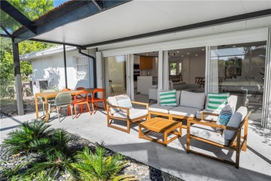 Renovated Mid-Century Modern Pool Home in the Heart of South on Whiskey Creek Country Club in Florida - for sale on GolfHomes.com, golf home, golf lot