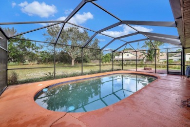 Charming pool home in Papaya Village on a rare 3/4 acre homesite on Eagle Wood Golf Course in Florida - for sale on GolfHomes.com, golf home, golf lot