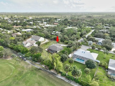 Charming pool home in Papaya Village on a rare 3/4 acre homesite on Eagle Wood Golf Course in Florida - for sale on GolfHomes.com, golf home, golf lot