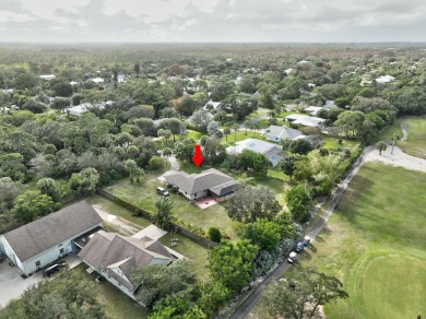 Charming pool home in Papaya Village on a rare 3/4 acre homesite on Eagle Wood Golf Course in Florida - for sale on GolfHomes.com, golf home, golf lot