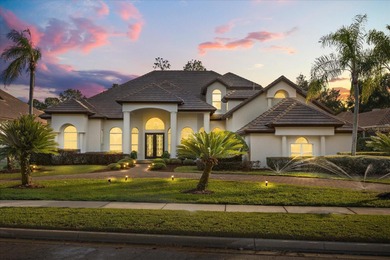 Life unfolds beautifully in this golf front estate in the on The Legacy Club At Alaqua Lakes in Florida - for sale on GolfHomes.com, golf home, golf lot
