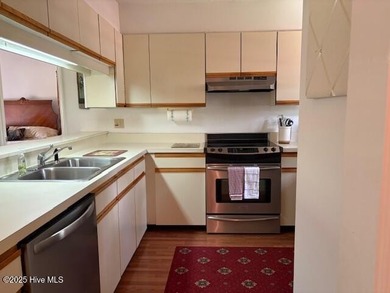 This two-bedroom townhome is located on the 12th hole of on Pinehurst  No. 6 Golf Course in North Carolina - for sale on GolfHomes.com, golf home, golf lot