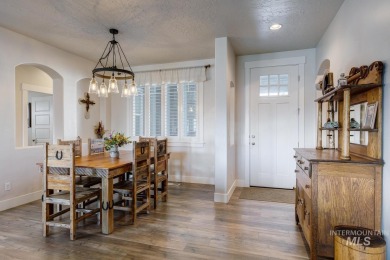 A meticulous home offering a seamless open-concept design with on Hunters Point Golf Club in Idaho - for sale on GolfHomes.com, golf home, golf lot