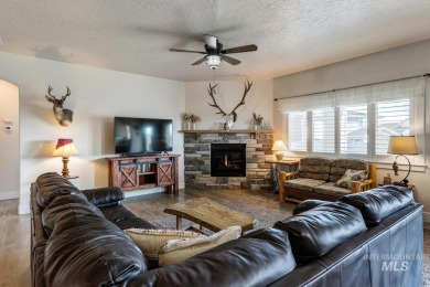 A meticulous home offering a seamless open-concept design with on Hunters Point Golf Club in Idaho - for sale on GolfHomes.com, golf home, golf lot