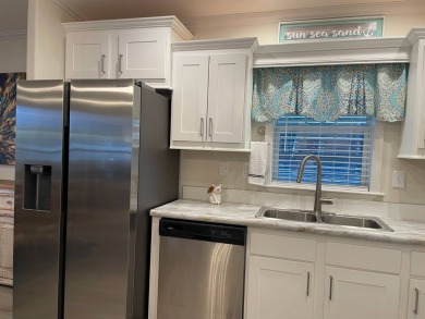Welcome to Your Slice of Paradise in Old Bridge Village!  Step on Riverbend Golf and Country Club in Florida - for sale on GolfHomes.com, golf home, golf lot