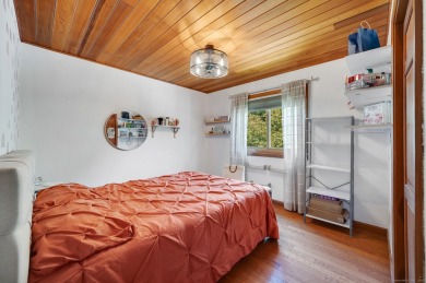 Set on a generous half-acre corner lot, this 3,400 sq ft home on Ailing Memorial Golf Course in Connecticut - for sale on GolfHomes.com, golf home, golf lot