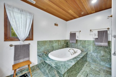 Set on a generous half-acre corner lot, this 3,400 sq ft home on Ailing Memorial Golf Course in Connecticut - for sale on GolfHomes.com, golf home, golf lot