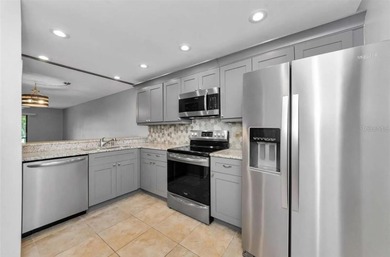 Welcome Home!  This renovated condo is simply beautiful! on East Lake Woodlands Country Club in Florida - for sale on GolfHomes.com, golf home, golf lot