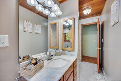 Set on a generous half-acre corner lot, this 3,400 sq ft home on Ailing Memorial Golf Course in Connecticut - for sale on GolfHomes.com, golf home, golf lot