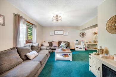 Set on a generous half-acre corner lot, this 3,400 sq ft home on Ailing Memorial Golf Course in Connecticut - for sale on GolfHomes.com, golf home, golf lot