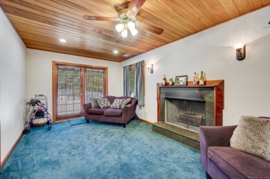 Set on a generous half-acre corner lot, this 3,400 sq ft home on Ailing Memorial Golf Course in Connecticut - for sale on GolfHomes.com, golf home, golf lot