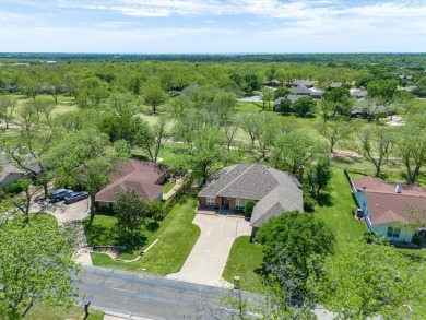 EXCEPTIONAL new listing in Pecan Plantation that's just had a on Pecan Plantation Country Club in Texas - for sale on GolfHomes.com, golf home, golf lot