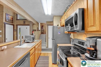 Turnkey Mountain Escape with Slope-Side Access - Snow Ridge on Jack Frost National Golf Course in Pennsylvania - for sale on GolfHomes.com, golf home, golf lot