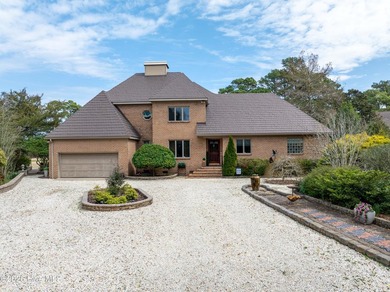 Wake up to golf course and ICW views at 413 Sawgrass Cove in on North Shore Country Club in North Carolina - for sale on GolfHomes.com, golf home, golf lot