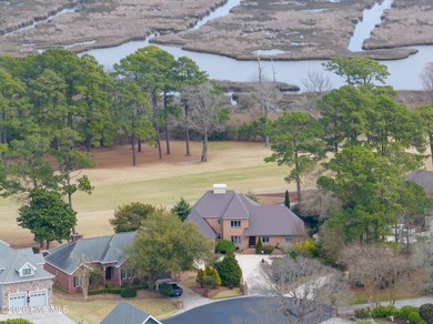 Wake up to golf course and ICW views at 413 Sawgrass Cove in on North Shore Country Club in North Carolina - for sale on GolfHomes.com, golf home, golf lot