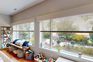 Wake up to golf course and ICW views at 413 Sawgrass Cove in on North Shore Country Club in North Carolina - for sale on GolfHomes.com, golf home, golf lot