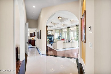 Discover refined luxury and timeless craftsmanship in this on Ocean Ridge Plantation in North Carolina - for sale on GolfHomes.com, golf home, golf lot