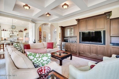 Discover refined luxury and timeless craftsmanship in this on Ocean Ridge Plantation in North Carolina - for sale on GolfHomes.com, golf home, golf lot