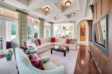 Discover refined luxury and timeless craftsmanship in this on Ocean Ridge Plantation in North Carolina - for sale on GolfHomes.com, golf home, golf lot