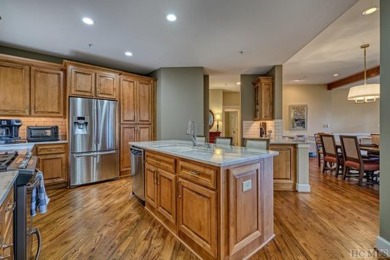 Experience luxury living in this 3-bedroom, 3-bath condominium on Old Edwards Club in North Carolina - for sale on GolfHomes.com, golf home, golf lot