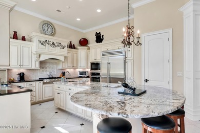 Discover refined luxury and timeless craftsmanship in this on Ocean Ridge Plantation in North Carolina - for sale on GolfHomes.com, golf home, golf lot